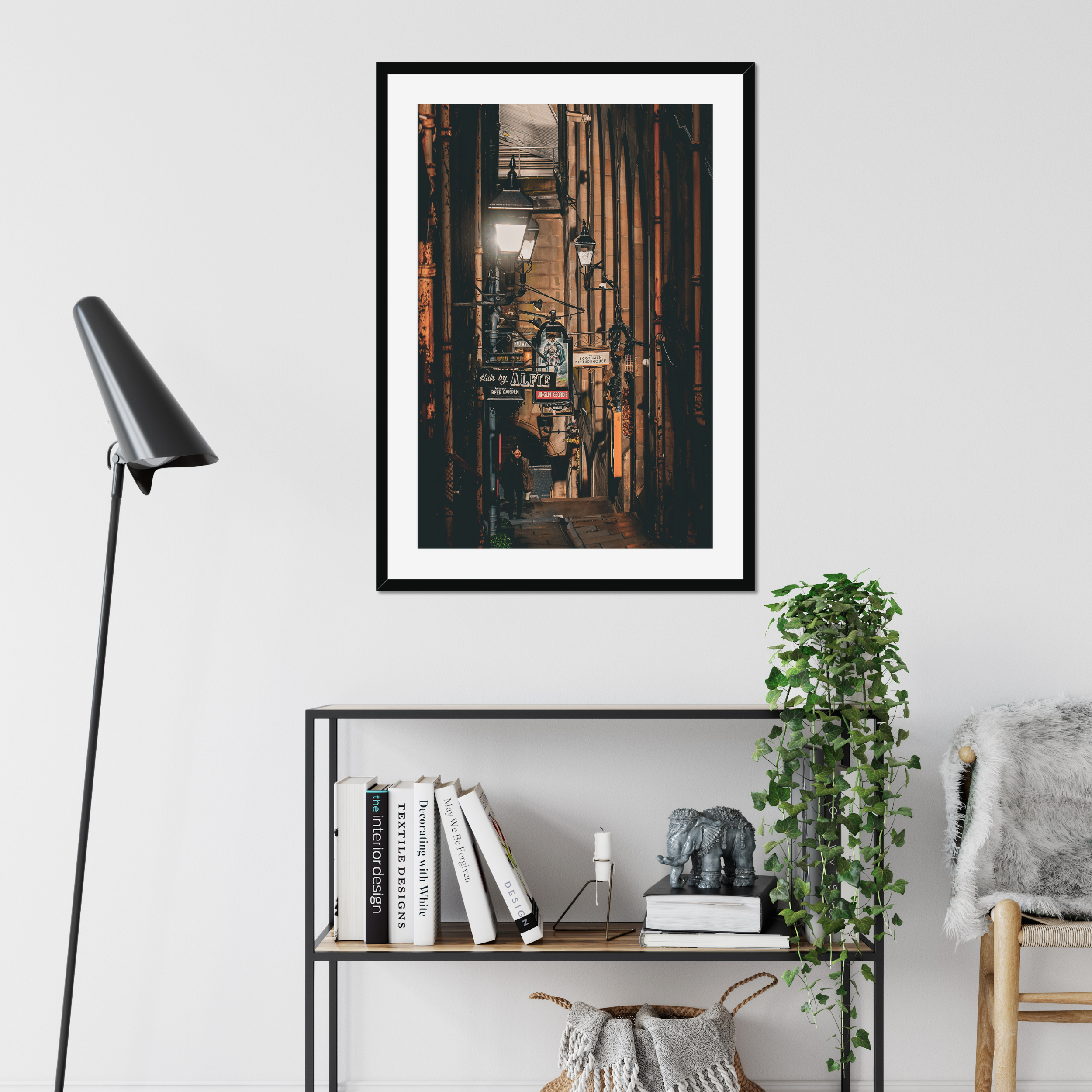 Atmospheric fine art photography of a figure walking through an Edinburgh close. A study in light, shadow and quiet movement from the Light &amp; Shadow collection.