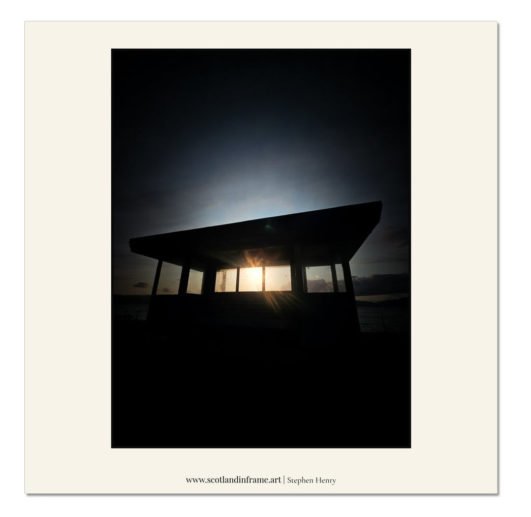 Contemporary photograph of one of the Old Cabanas on the esplanade in Gourock at Sunset.