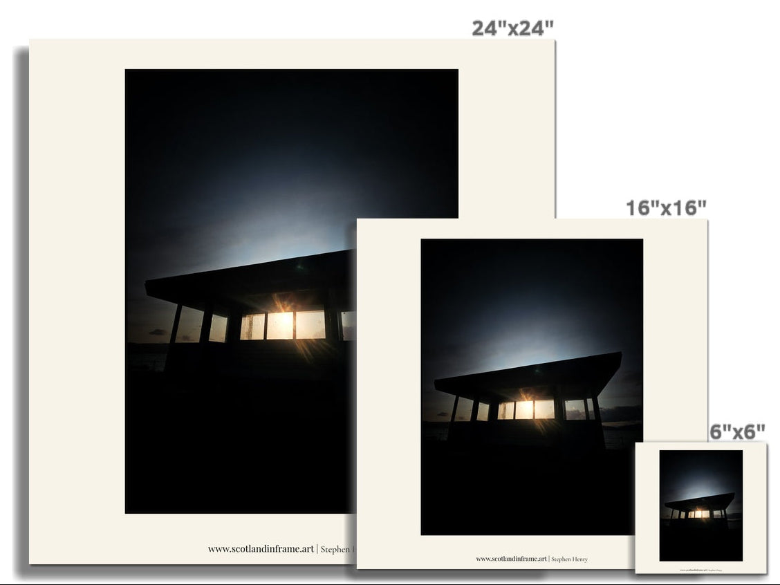 Contemporary photograph of one of the Old Cabanas on the esplanade in Gourock at Sunset.