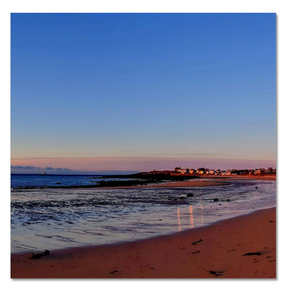 Curving beach and shallow tide at Ellie to Earlsferry, Fife, captured in soft early light as part of a continuous four-panel coastal panorama.