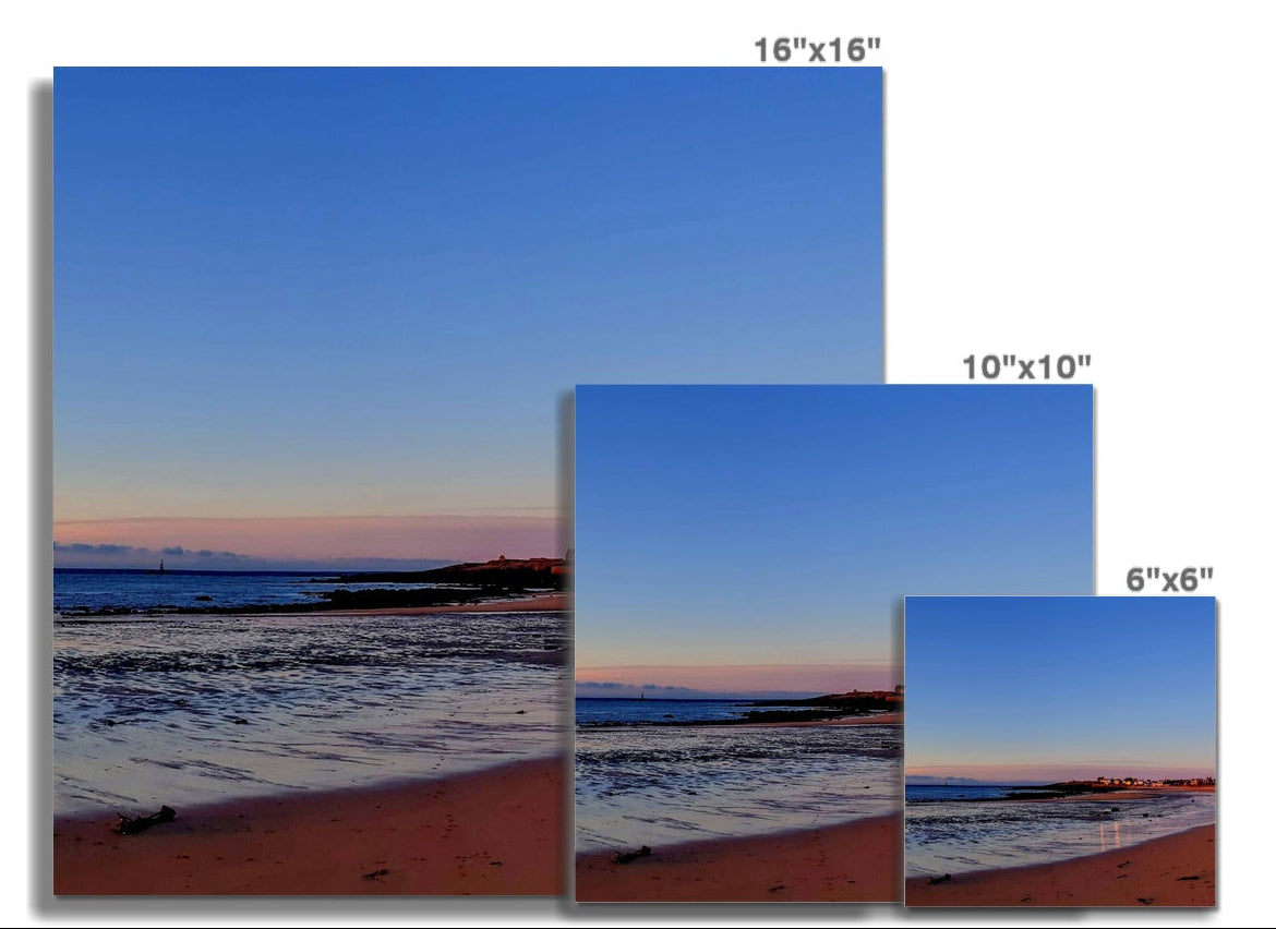 Curving beach and shallow tide at Ellie to Earlsferry, Fife, captured in soft early light as part of a continuous four-panel coastal panorama.